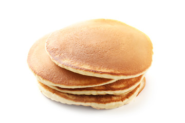 Stack of tasty homemade pancakes on white background