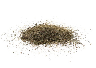 Pile of dried oregano spice, leaves isolated on white background