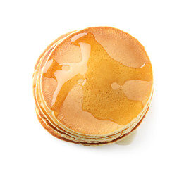 Tasty pancakes with honey on white background