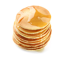 Tasty pancakes with honey on white background