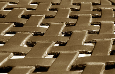Part of metal construction pattern in brown tone.