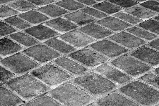 Cobble stone pavement in black and white.