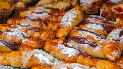 Fresh cookies with chocolate and powdered sugar