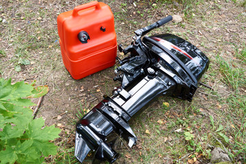 Boat motor and canister with gasoline