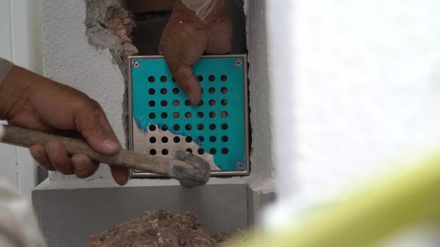 builder hacking of wall