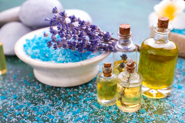 Obraz na płótnie Canvas Composition with sea salt, essential oil and lavender on table