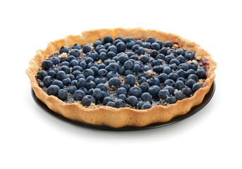 Plate with delicious blueberry pie on white background
