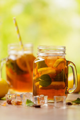Iced tea with lemon and ice cubes