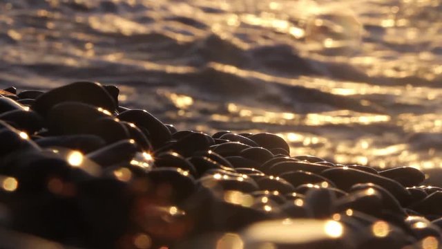 Golden Hour Pebbles on Beach, Waves splashing, Sunset/Sunrise