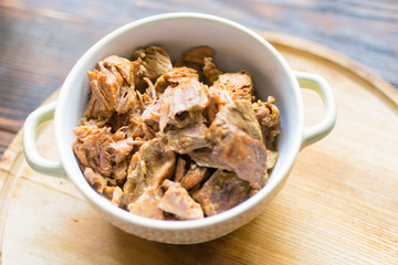 Stew in a plate. Pieces of meat cooked without oil.