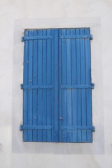 Blue window shutters