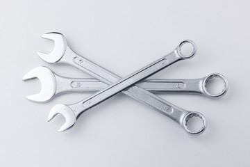 Pile of Three Spanners Flat Lay on White Background