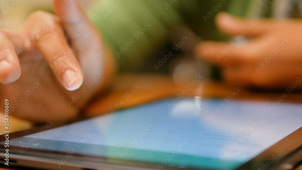 Poster hand of woman using tablet with for application and wireless technology device concept select focus 