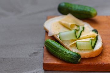 sandwich  (cheese, bread, cucumbers, mint). food background