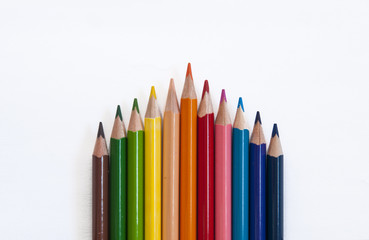 colored pencils on white background