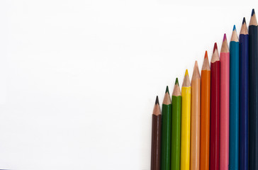 colored pencils on white background