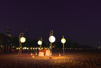 Outdoor Romantic Dinner Table For Two At Stary Night Sky At The Beach