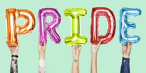 Colorful alphabet balloons forming the word pride