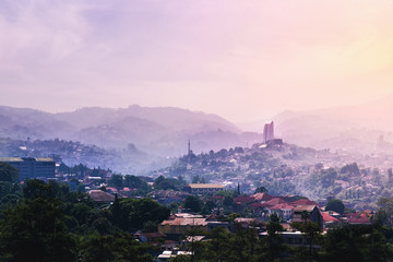 Landmark of Bandung From Dago Hill/Mountain at Sunrise on Misty and Fog Morning. Concept of Utopia...