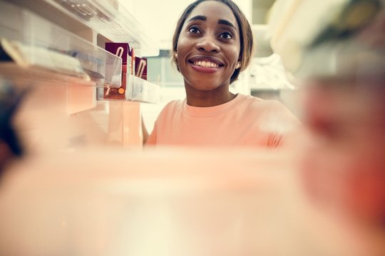 African Descent Woman Open The Fridge