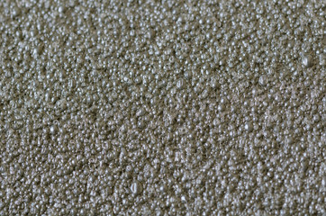 Closeup of textured grey wall background.