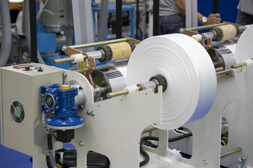 Automatic packing machine with plastic bag and paper box