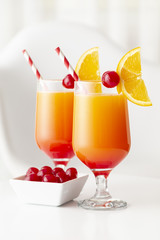 Two tequila sunrise cocktails