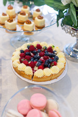 Naked cake with raspberry and berries