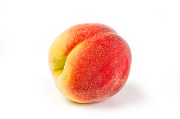 Peach juicy bright and beautiful shot close-up on a white background