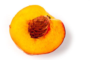 Peach juicy bright and beautiful shot close-up on a white background