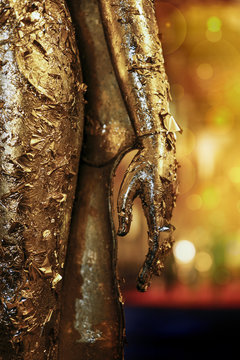 close up golden buddha hand