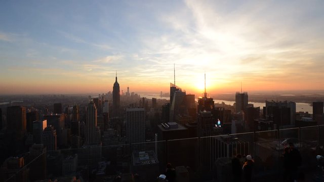 Time lapse of sunset over New York City from the Rockefeller Center in Manhattan, USA