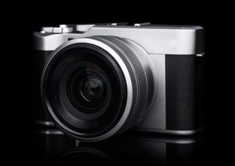Fototapeta na wymiar Digital DSLR photo camera with black leather grip