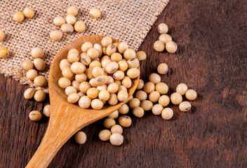 Soybean oil on a wooden background. rustic style