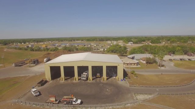 Aerial footage of the landfill transfer station in St.Cloud Florida.