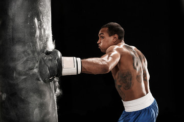 Fototapeta na wymiar Boxing training and punching bag