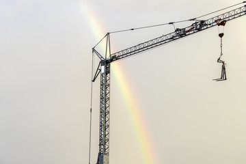 rainbow and a construction crane