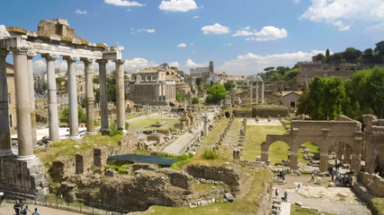 Fototapeta na wymiar Old ruins and columns of Roman Forum in Italy, tourism in Rome, sightseeing
