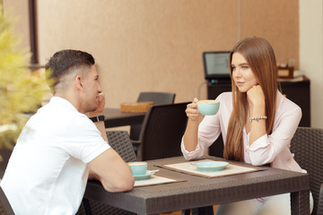 Two people in cafe enjoying the time spending with each other