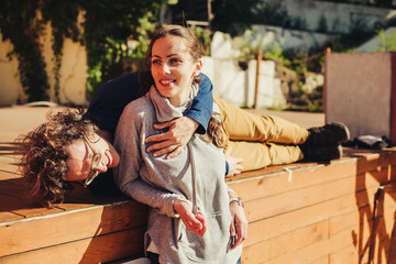Couple hugs each other at the park outdoor
