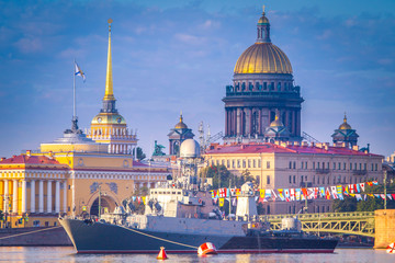 Fototapeta na wymiar Saint Petersburg. Saint Isaac's Cathedral. Warships against the backdrop of the city Petersburg. Russia. Neva River. Military ships of Russia.