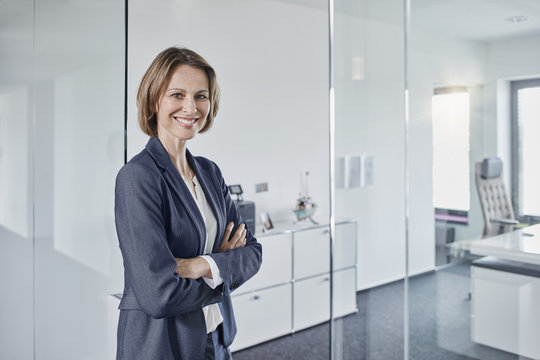 Portrait of smiling businesswoman in office