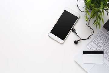 Business Items dropped in creative Disorder on white Table