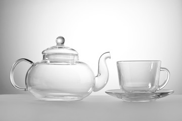 transparent glass teapot with a Cup of tea drink
