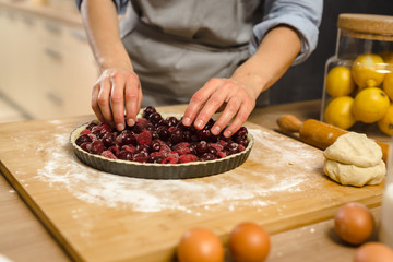 preparing sweet cherry pie