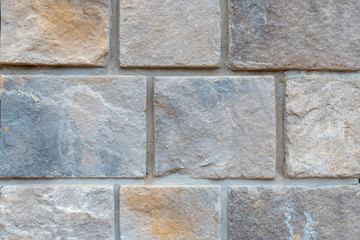 Gray stone wall closeup background texture