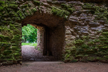 The interior of the ancient stone fortress with moss