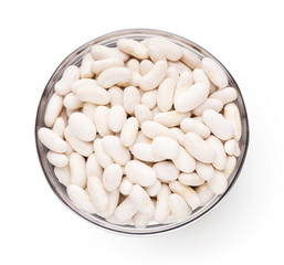 Top view of glass bowl full of white beans