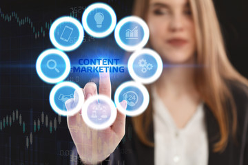 The concept of business, technology, the Internet and the network. A young entrepreneur working on a virtual screen of the future and sees the inscription: Content marketing