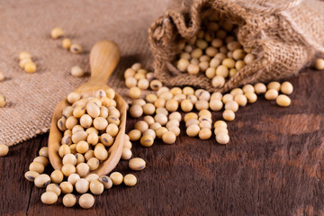 Soybean oil on a wooden background. rustic style